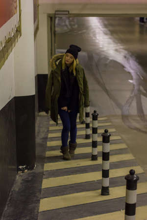 portrait of stylish young girl in the Parking lotの写真素材