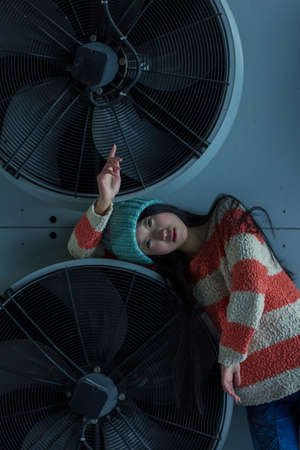 portrait of stylish Asian girls near air conditioners