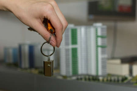 Girl  holds the keys to the houseの写真素材