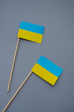 Kids are making small paper flags of Ukraine and Lithuania, Workspace in the kindergartenの写真素材