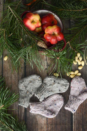 Small chunky and warm baby socks, made of woolen yarnの写真素材