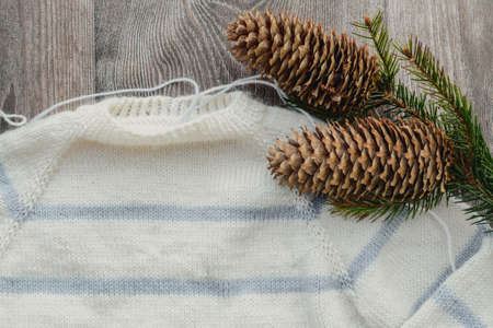 Striped baby sweater made of high quality woolen yarnの写真素材