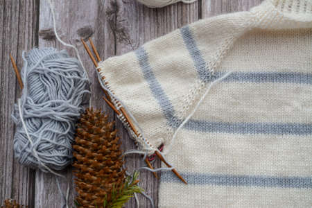 Striped baby sweater made of high quality woolen yarnの写真素材