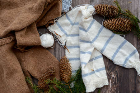Striped baby sweater made of high quality woolen yarnの写真素材