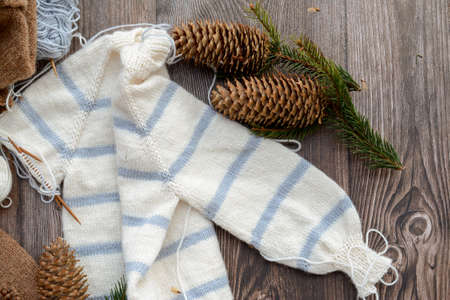 Striped baby sweater made of high quality woolen yarnの写真素材