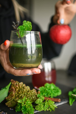 Choosing between green and red vegan cocktailsの写真素材