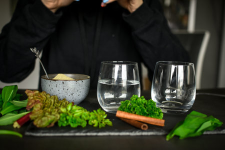 Making healthy green cocktail, in the kitchenの写真素材