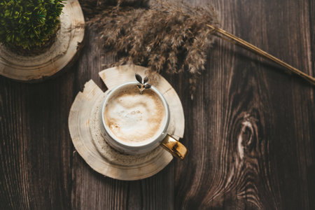 Coffee and candies on dark wooden backgroundの写真素材