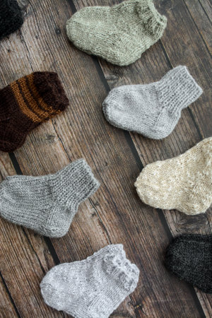 variety of socks on a wooden background,の写真素材