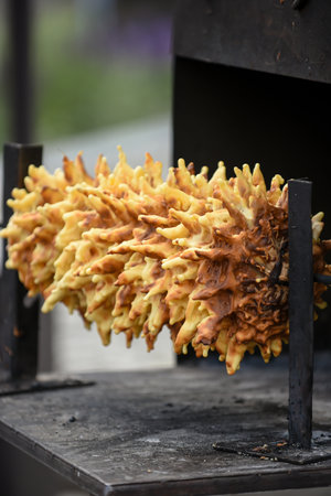 The process of making traditional Lithuanian tree cake