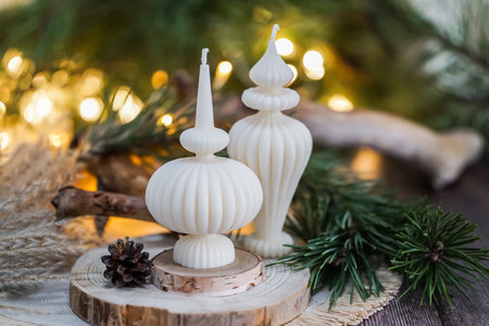 Christmas candles in the form of a Christmas tree on a wooden backgroundの写真素材