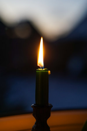 Candle in the dark, close-up, shallow depth of fieldの写真素材