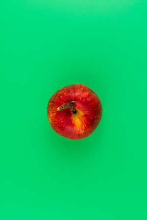 Sweet red apple with a stick from an apple. like the poison apple of Snow White. Magic happens by...