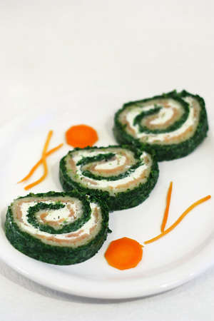 Spinach and salmon rollsの写真素材