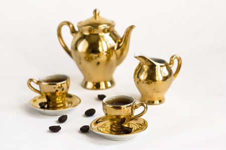 Coffee cups and coffee pots on white backgroundの写真素材