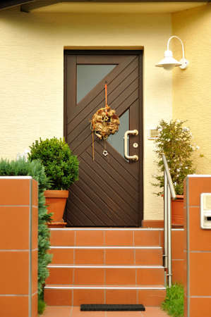 Front door of the modern house. Front view of modern house door entrance.の写真素材
