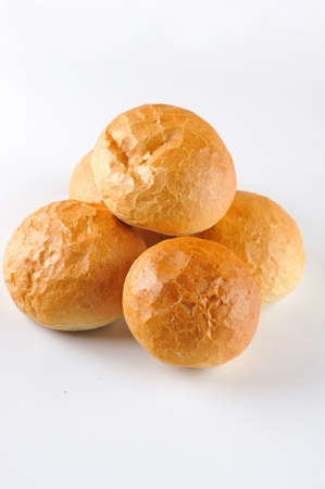 Small loaf of bread. Group of easy dinner rolls isolated on the white background.