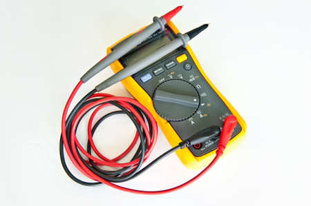 Digital electronic multimeter. Digital electronic multimeter isolated on the white background.