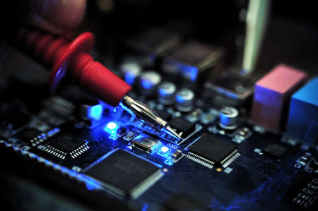 Measuring the electric signal. Electronic PCB board device for students laboratory research and...