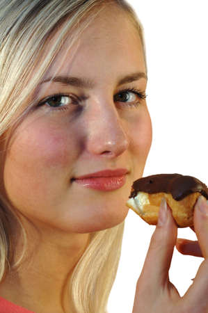 Model eating cream pastryの写真素材
