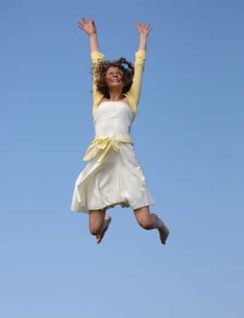 Very Attractive Teenager Jumping for Joyの写真素材