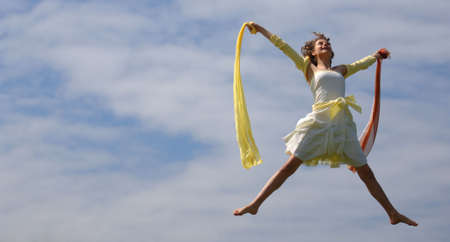 Very Attractive Teenager Jumping for Joyの写真素材