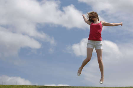 Very Attractive Teenager Jumping for Joy