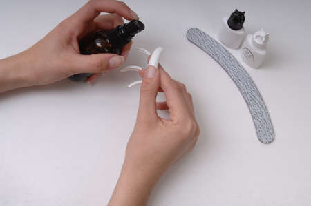 Acrylic Nails and Neatly Manicured Fingernailsの写真素材