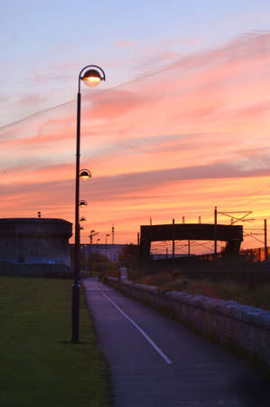 Train coming into shot at Duskの写真素材