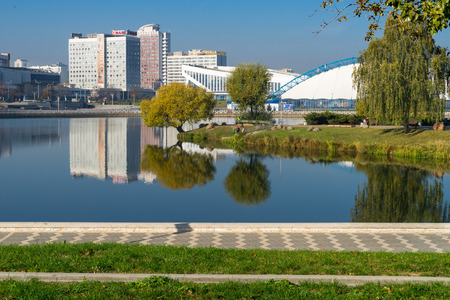 MINSK, BELARUS - OCTOBER 14, 2018: Minsk sports palace and multistory housesのeditorial素材
