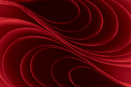 Abstract artistic background showing the flexibility and texture of paper under controlled studio...