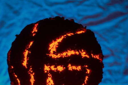 Abstract representation of a core of pure energy or plasma contained within a black mineral...