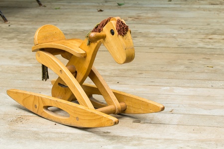 rocking horse on the floor の写真素材