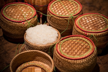 Asian Thai sticky rice in a bamboo wooden style boxの写真素材