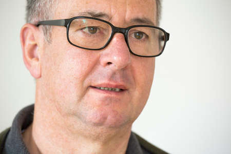 Portrait of a mature man with glasses