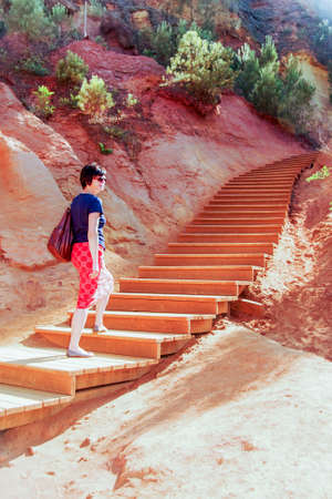 Woman in ocher fraction of Roussillonの写真素材