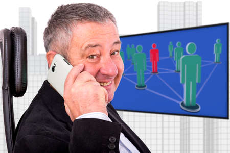 Man sitting by the phone at the workplace