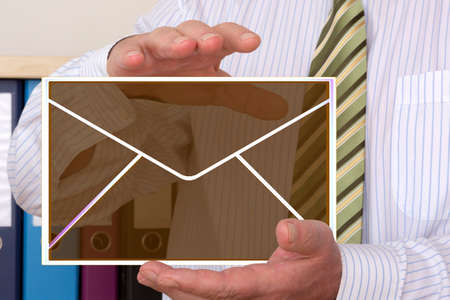 Businessman with virtual letterの写真素材