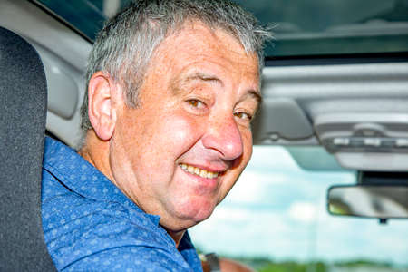 Man in a carの写真素材