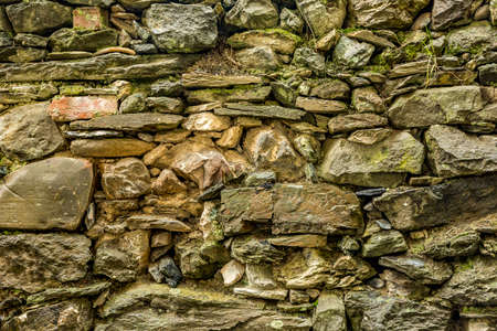 Wall made of natural stones.