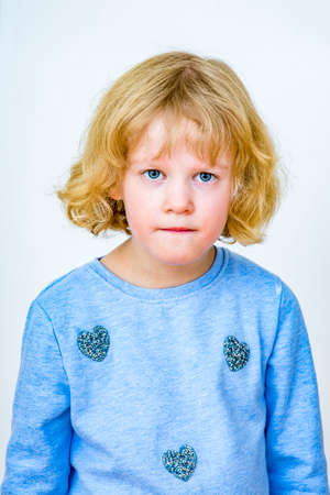 Portrait of a young blond girl
