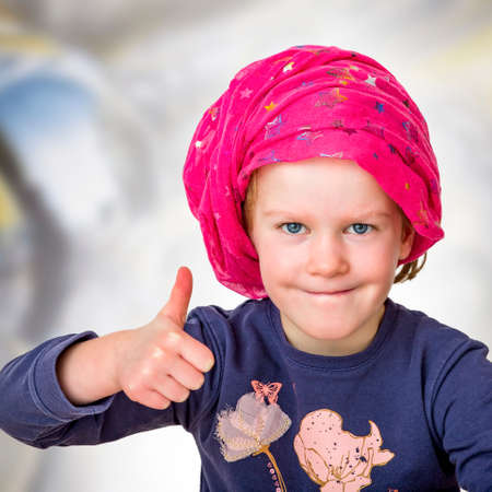 Girl with a headscarfの写真素材