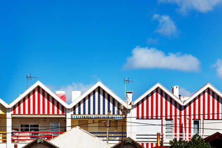 Colorful striped house facades in Portugalの写真素材