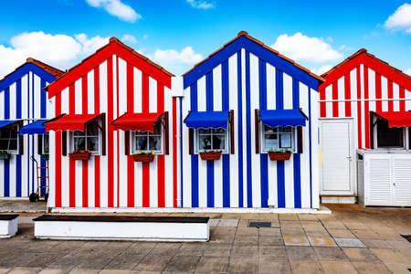 Colorful striped house facades in Portugalの写真素材