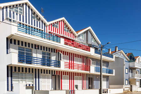 Colorful striped house facades in Portugalの写真素材