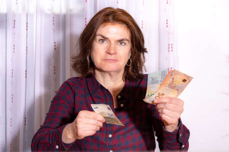 Woman counts bills