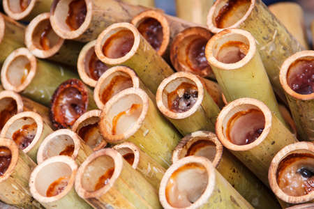 glutinous rice roasted in bamboo jointsの写真素材