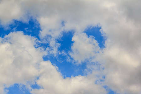 beautiful fresh, bright clouds with blue sky in bright day for scene and backgroundの写真素材
