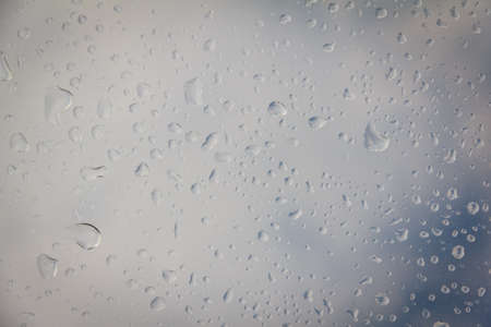 rain drop on the plastic roof with the sun light