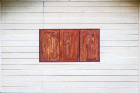 the white wall and wood windows, backgroundの写真素材